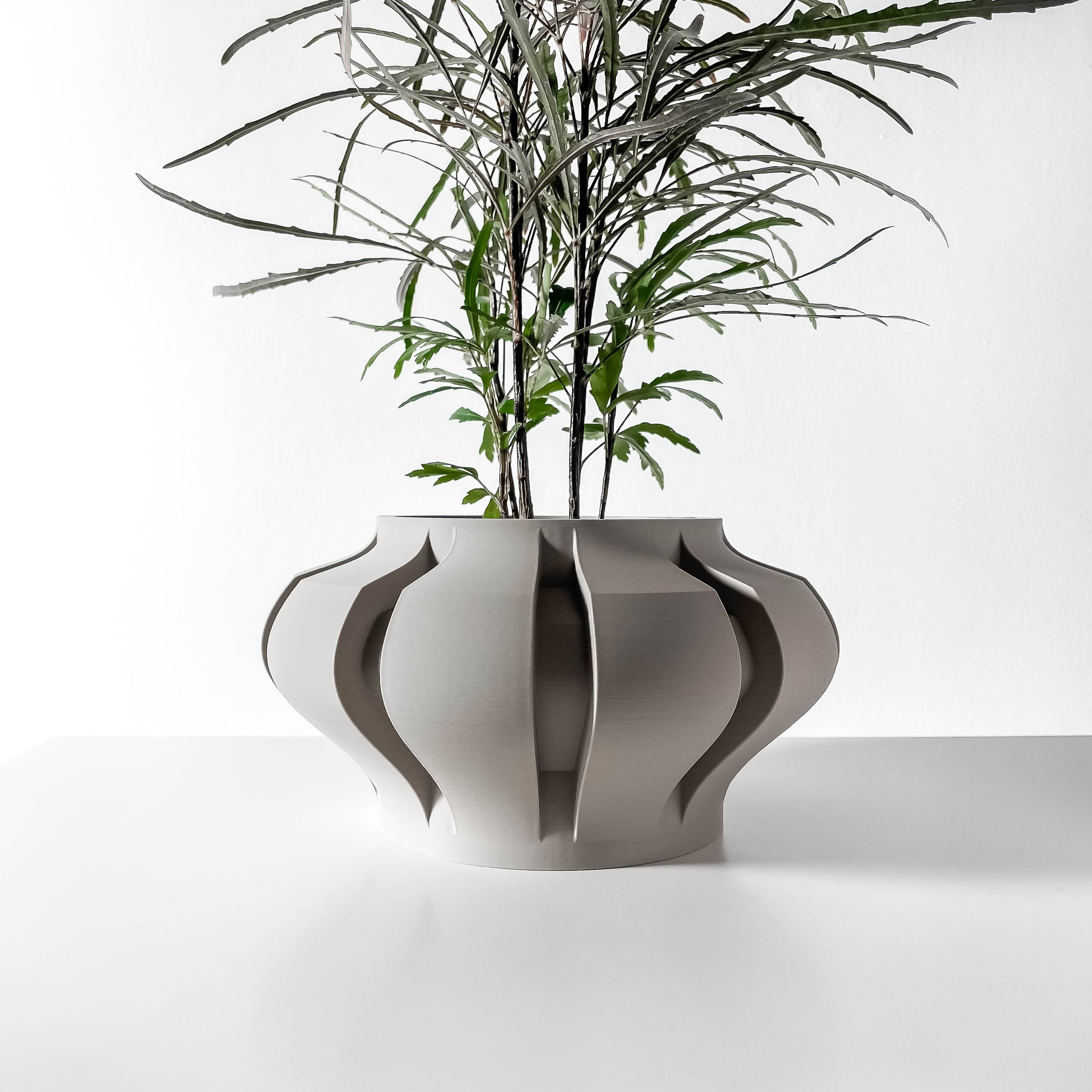 The Ariko Planter Pot With Drainage Tray & Stand Included