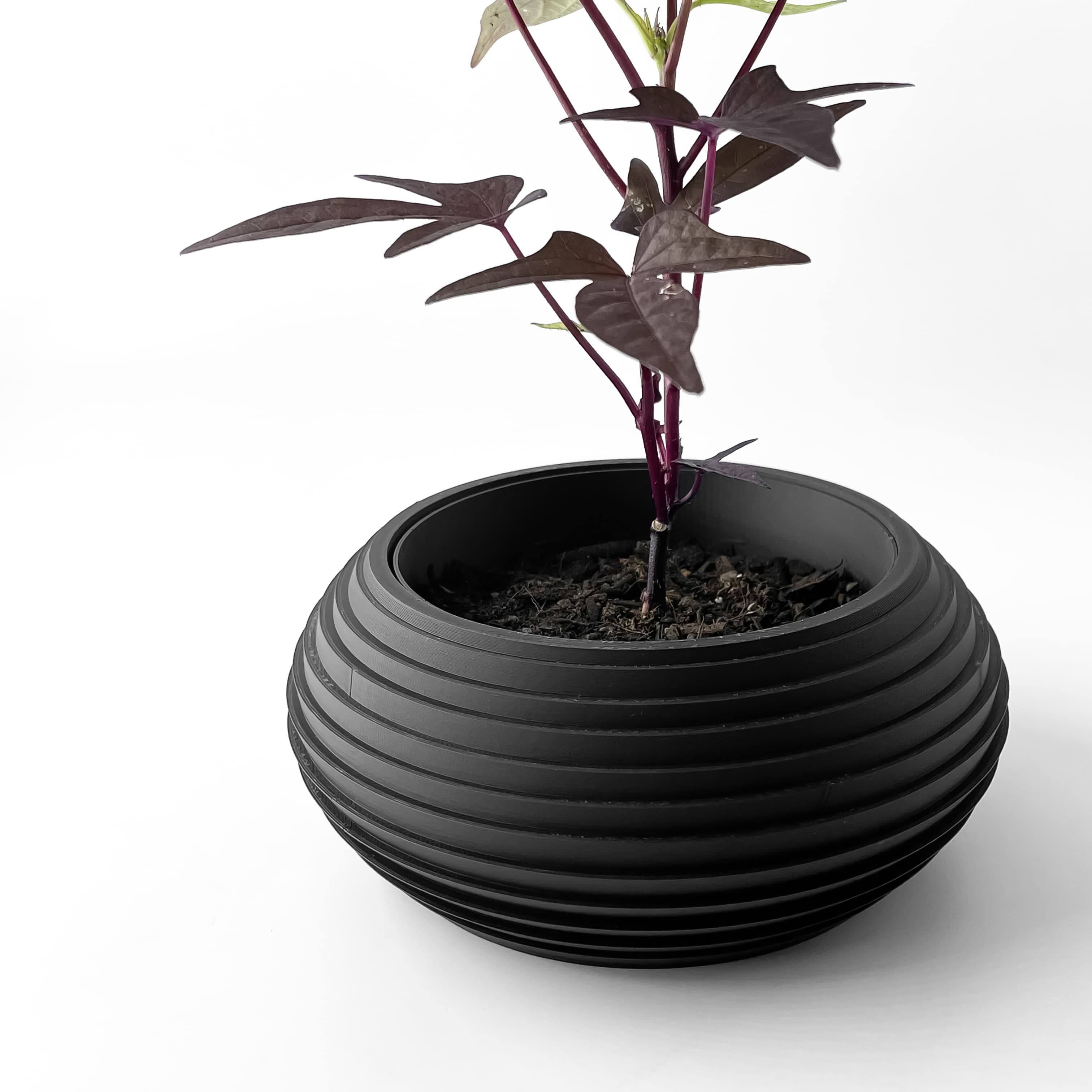 The Frons Planter Pot With Drainage Tray & Stand Included