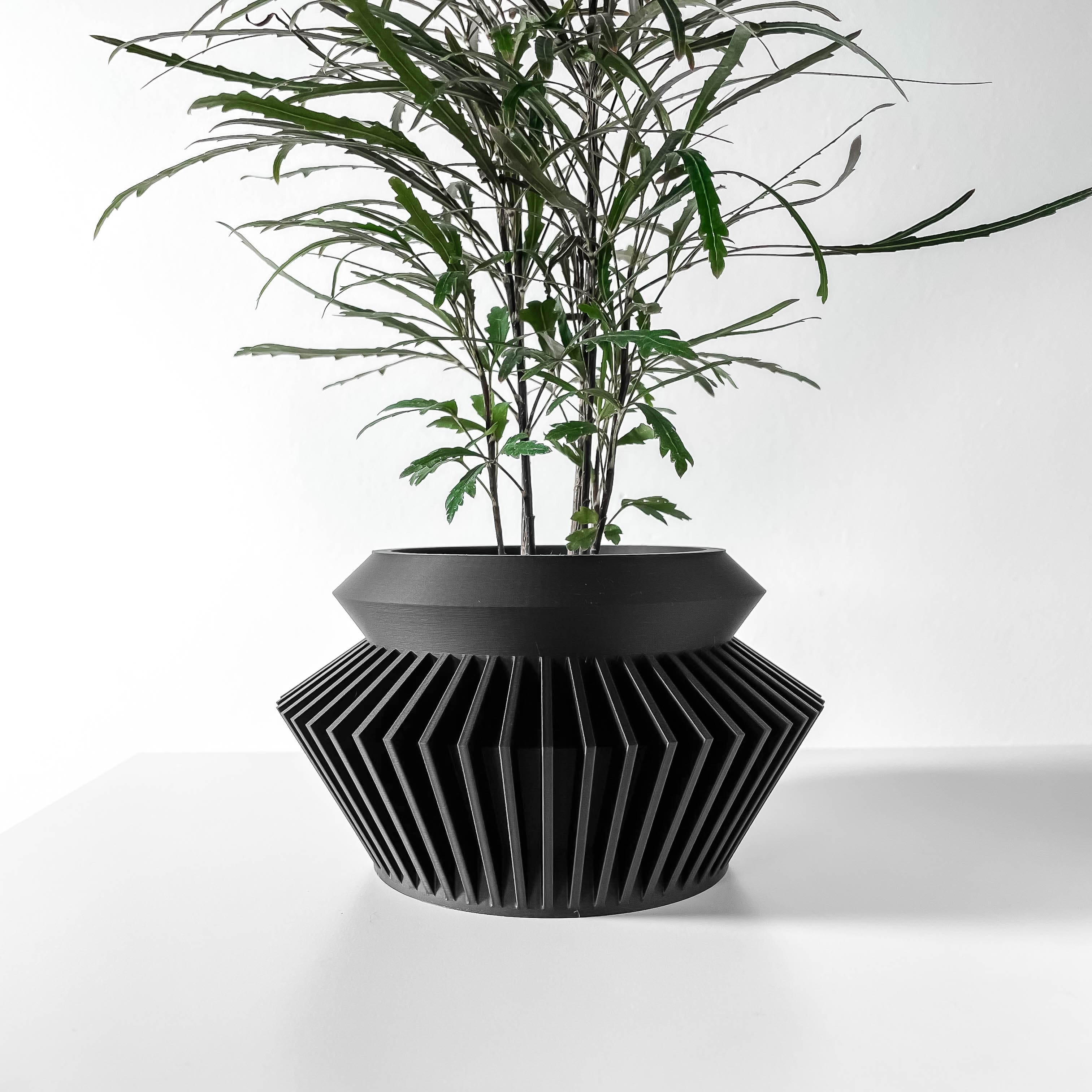 The Quano Planter Pot With Drainage Tray & Stand Included